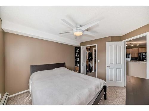 2216-2518 Fish Creek Boulevard Sw, Calgary, AB - Indoor Photo Showing Bedroom