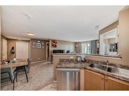 2216-2518 Fish Creek Boulevard Sw, Calgary, AB - Indoor Photo Showing Kitchen With Double Sink