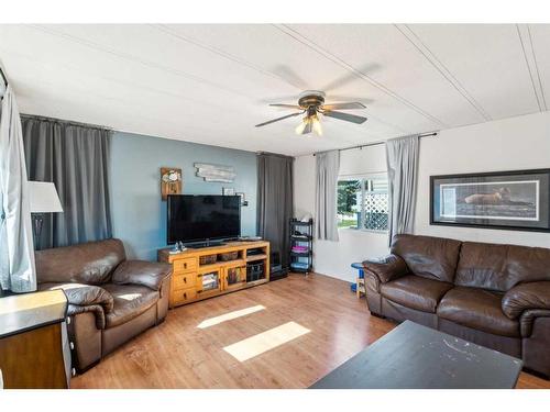 80 Spring Haven Close Se, Airdrie, AB - Indoor Photo Showing Living Room