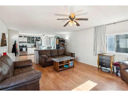 80 Spring Haven Close Se, Airdrie, AB - Indoor Photo Showing Living Room