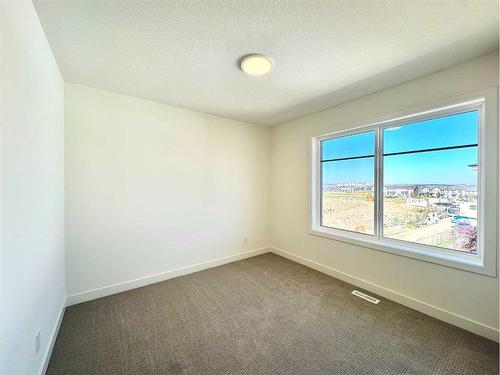 503-857 Belmont Drive Sw, Calgary, AB - Indoor Photo Showing Other Room