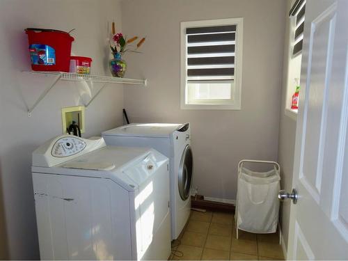 70 Saddlecrest Terrace Ne, Calgary, AB - Indoor Photo Showing Laundry Room