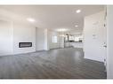 513 Clearwater Heath, Chestermere, AB  - Indoor Photo Showing Living Room With Fireplace 