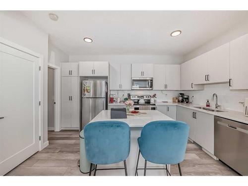 27 Tuscany Summit Square Nw, Calgary, AB - Indoor Photo Showing Kitchen With Stainless Steel Kitchen With Double Sink With Upgraded Kitchen