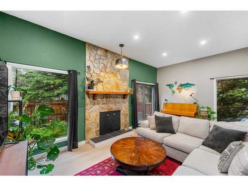 545 Point Mckay Grove Nw, Calgary, AB - Indoor Photo Showing Living Room With Fireplace