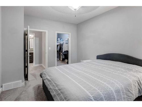 1212-250 Sage Valley Road Nw, Calgary, AB - Indoor Photo Showing Bedroom