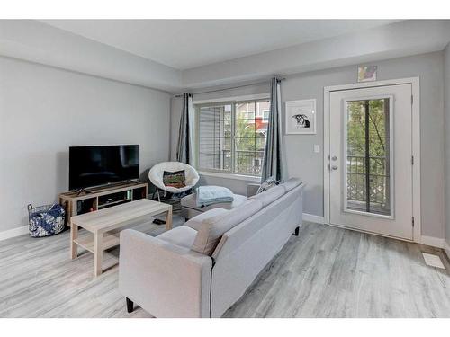 1212-250 Sage Valley Road Nw, Calgary, AB - Indoor Photo Showing Living Room