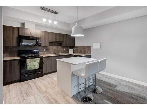 1212-250 Sage Valley Road Nw, Calgary, AB - Indoor Photo Showing Kitchen