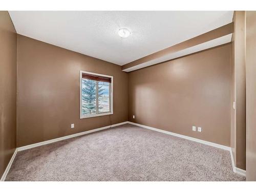 4205-92 Crystal Shores Road, Okotoks, AB - Indoor Photo Showing Other Room