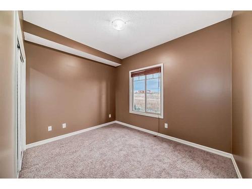 4205-92 Crystal Shores Road, Okotoks, AB - Indoor Photo Showing Other Room