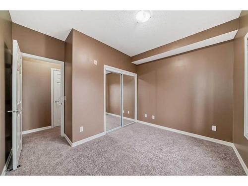 4205-92 Crystal Shores Road, Okotoks, AB - Indoor Photo Showing Other Room