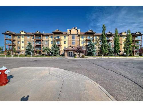 4205-92 Crystal Shores Road, Okotoks, AB - Outdoor With Facade