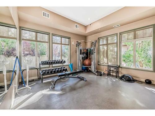 4205-92 Crystal Shores Road, Okotoks, AB - Indoor Photo Showing Gym Room