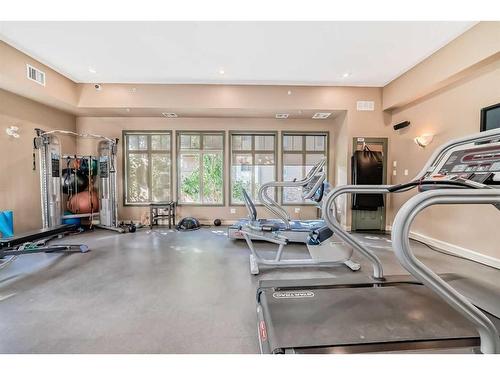 4205-92 Crystal Shores Road, Okotoks, AB - Indoor Photo Showing Gym Room