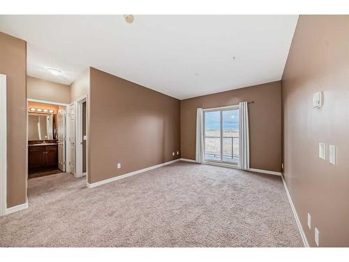 4205-92 Crystal Shores Road, Okotoks, AB - Indoor Photo Showing Other Room