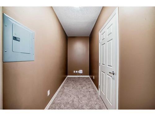 4205-92 Crystal Shores Road, Okotoks, AB - Indoor Photo Showing Other Room