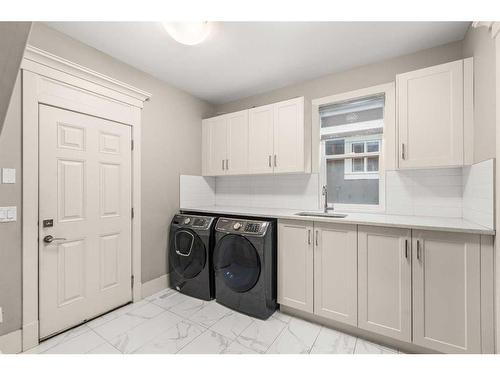 144 Kinniburgh Loop, Chestermere, AB - Indoor Photo Showing Laundry Room