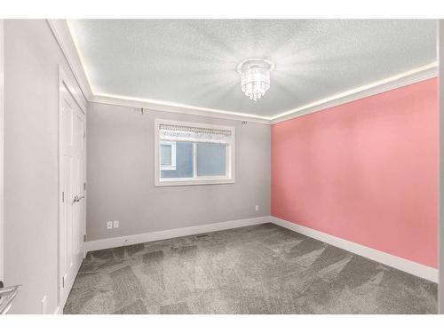 144 Kinniburgh Loop, Chestermere, AB - Indoor Photo Showing Other Room