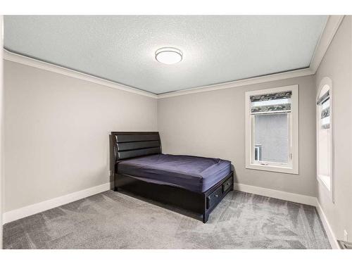 144 Kinniburgh Loop, Chestermere, AB - Indoor Photo Showing Bedroom