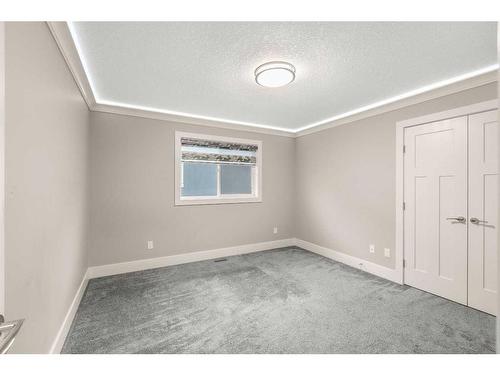 144 Kinniburgh Loop, Chestermere, AB - Indoor Photo Showing Other Room