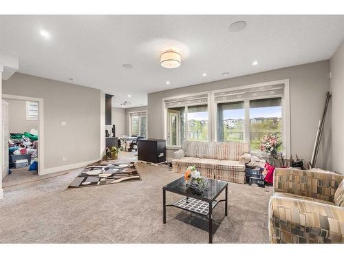 144 Kinniburgh Loop, Chestermere, AB - Indoor Photo Showing Living Room