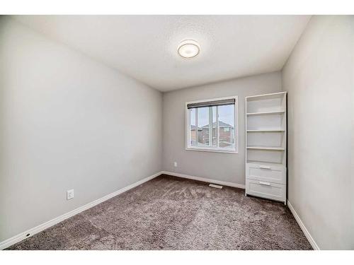 730 Redstone Drive Ne, Calgary, AB - Indoor Photo Showing Other Room