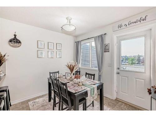 302-800 Yankee Valley Boulevard Se, Airdrie, AB - Indoor Photo Showing Dining Room