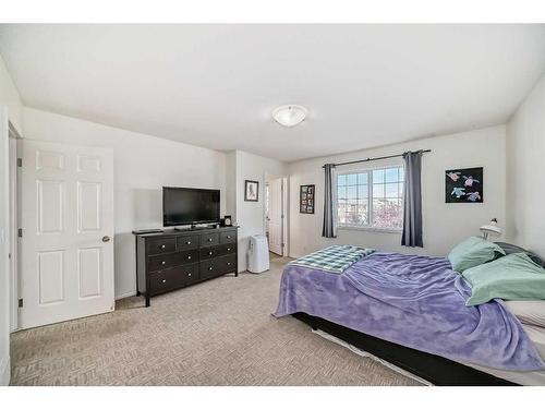 302-800 Yankee Valley Boulevard Se, Airdrie, AB - Indoor Photo Showing Bedroom