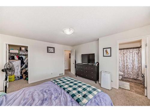 302-800 Yankee Valley Boulevard Se, Airdrie, AB - Indoor Photo Showing Bedroom