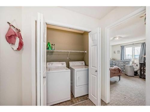 302-800 Yankee Valley Boulevard Se, Airdrie, AB - Indoor Photo Showing Laundry Room