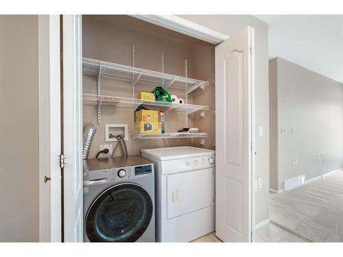 411 Hope Bay, Rural Rocky View County, AB - Indoor Photo Showing Laundry Room