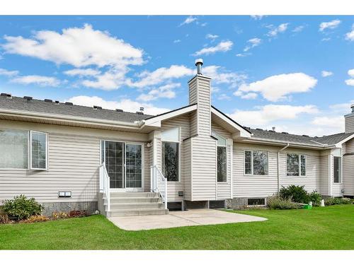 411 Hope Bay, Rural Rocky View County, AB - Outdoor With Facade