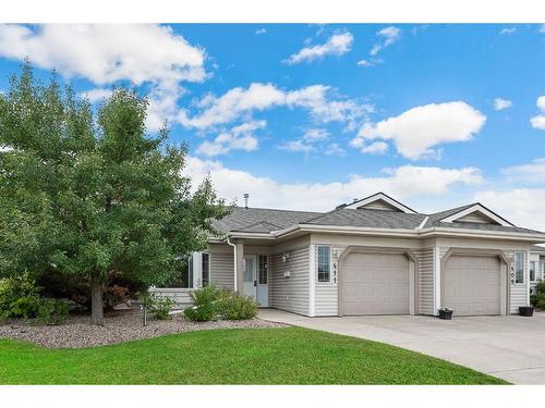 411 Hope Bay, Rural Rocky View County, AB - Outdoor With Facade