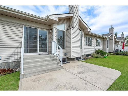 411 Hope Bay, Rural Rocky View County, AB - Outdoor With Facade