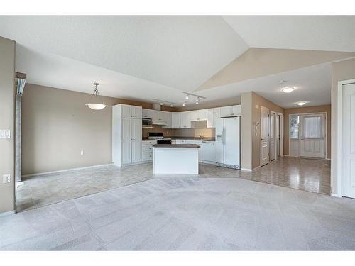 411 Hope Bay, Rural Rocky View County, AB - Indoor Photo Showing Kitchen