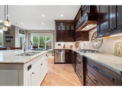 2621 Coopers Circle Sw, Airdrie, AB - Indoor Photo Showing Kitchen With Double Sink With Upgraded Kitchen