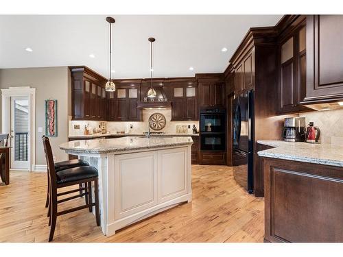 2621 Coopers Circle Sw, Airdrie, AB - Indoor Photo Showing Kitchen With Upgraded Kitchen