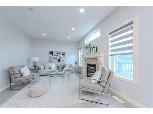 15 Saddleland Drive Ne, Calgary, AB - Indoor Photo Showing Living Room With Fireplace