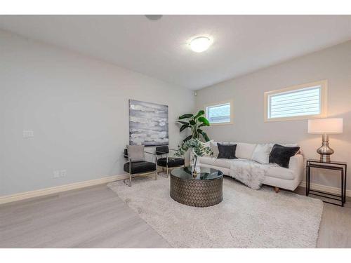 15 Saddleland Drive Ne, Calgary, AB - Indoor Photo Showing Living Room