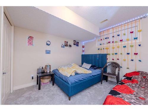 15 Saddleland Drive Ne, Calgary, AB - Indoor Photo Showing Bedroom