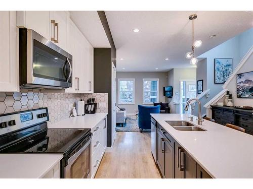 1278 Legacy Circle Se, Calgary, AB - Indoor Photo Showing Kitchen With Stainless Steel Kitchen With Double Sink With Upgraded Kitchen