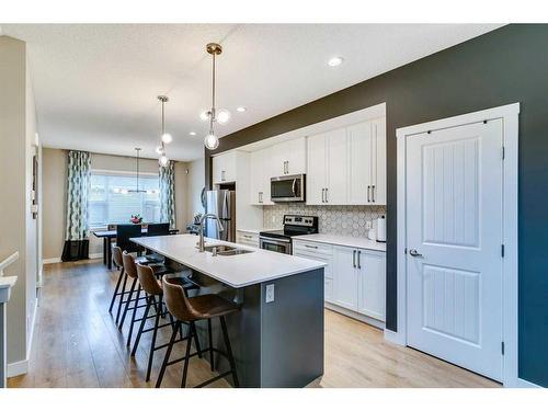 1278 Legacy Circle Se, Calgary, AB - Indoor Photo Showing Kitchen With Stainless Steel Kitchen With Double Sink