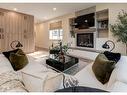 521 18A Street Nw, Calgary, AB  - Indoor Photo Showing Living Room With Fireplace 