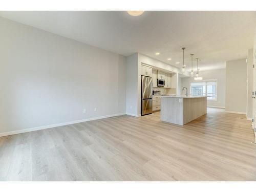 623-20295 Seton Way Se, Calgary, AB - Indoor Photo Showing Kitchen