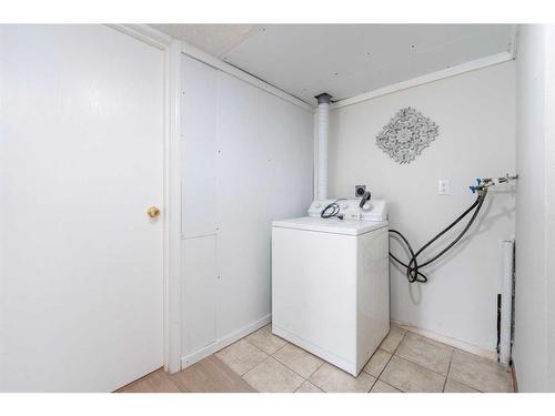 1-1412 43 Street Se, Calgary, AB - Indoor Photo Showing Laundry Room