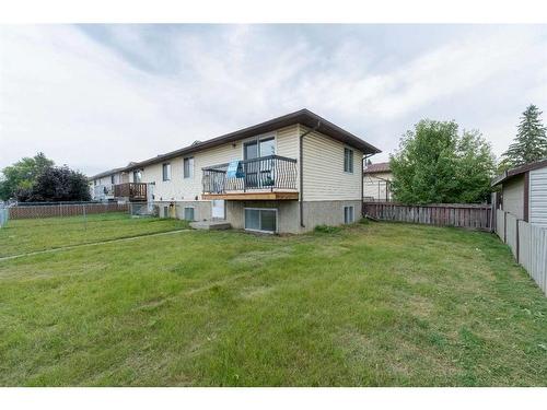 1-1412 43 Street Se, Calgary, AB - Outdoor With Backyard With Exterior