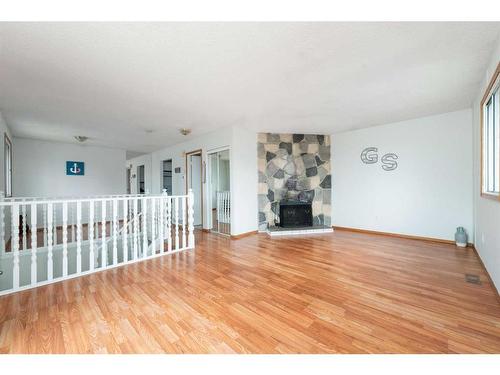 1-1412 43 Street Se, Calgary, AB - Indoor With Fireplace