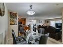 3308-10 Prestwick Bay Se, Calgary, AB  - Indoor Photo Showing Dining Room 