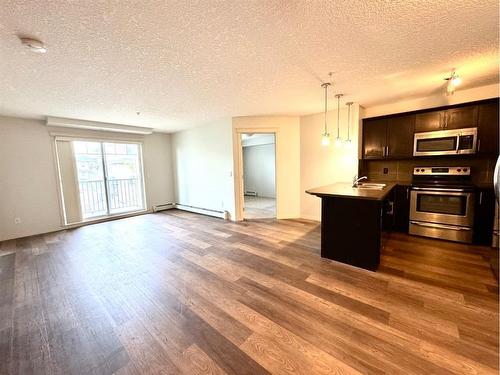 2319-175 Panatella Hill, Calgary, AB - Indoor Photo Showing Kitchen