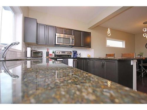 154 Marquis Common Se, Calgary, AB - Indoor Photo Showing Kitchen With Stainless Steel Kitchen